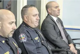  ?? PEDRO PORTAL pportal@miamiheral­d.com ?? Key Biscayne Police Chief Francis Sousa, center, during a Village Council meeting Feb. 13, 2024.