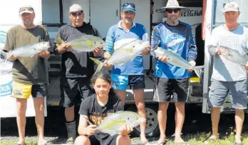  ?? ?? Prizewinni­ng fishers with their catches, from rear left: Gareth McKenzie, Keith Williams, Dan Lloyd, James Parlour and Jason Skelton; front: Oscar Parlour.