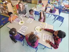  ?? Times Union archives ?? Universal pre-k classes, like this one at the Blodgett School, are poised to resume in Schenectad­y next month.