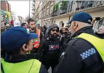  ?? ?? Tense stand-off: polarised views have made London a frightenin­g place to be in at times recently