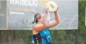  ?? ?? Left: Yarragon goal attack Courtney Green looks into the goal ring against Lang Lang in A grade on Saturday.