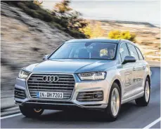  ?? FOTO: AUDI/DPA ?? Effizient: Plug-in-Hybride wie der Audi Q7 E-Tron gewinnen beim Verzögern Energie zurück.