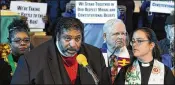  ?? JAY REEVES / AP ?? The Rev. William J. Barber, former head of the North Carolina NAACP, speaks at a rally in opposition to Republican U.S. Senate candidate Roy Moore at a church in Birmingham, Ala., on Saturday.