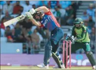  ?? (AFP) ?? England’s Jos Buttler hits a shot during his innings of 59 in the second T20I against Pakistan at the Headingley Cricket Ground in Leeds, England, on Sunday.