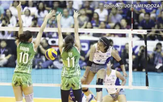  ?? Photo by Joey Mendoza ?? Opposing teams sending two or three blockers to defend against the prolific MVP was not an uncommon sight during her stint.