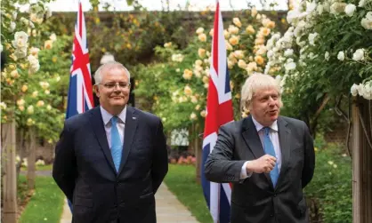  ?? Photograph: WPA/Getty Images ?? ‘Morrison’s government struck a discordant note at the G7 by refusing to pay even lip service to binding cuts to coal power.’ Scott Morrison, left, and Boris Johnson in the No 10 garden, 15 June 2021.