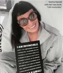  ??  ?? Norma Kamali with her new book,
“I Am Invincible.”