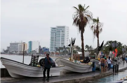  ?? Photograph: Reuters ?? Boats were stored out of the water on the seafront as Hurricane Orlene approached Mazatlán in Sinaloa, Mexico.