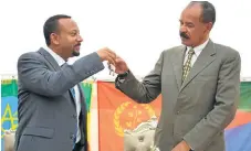  ?? /AFP ?? Key changes: Ethiopian Prime Minister Abiy Ahmed, left, and President Isaias Afwerki of Eritrea celebrate the reopening of the embassy of Eritrea in the Ethiopian capital Addis Ababa.