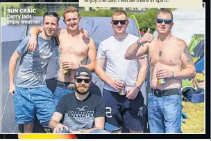  ??  ?? SUN CRAIC Derry lads enjoy weather