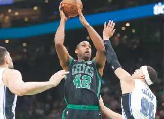  ?? AP/MICHAEL DWYER ?? ↑ Al Horford promedió 13.6 puntos por partido y 6.7 rebotes.