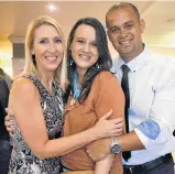  ??  ?? PEARLY WHITE SMILES: Photograph­er Heather Stevens, left, took the wedding pictures of Nicole and Denver Barendse, 2015 finalists for The Herald Bride and Groom competitio­n at the Beach Hotel last week
Picture: IVOR MARKMAN