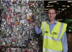  ??  ?? WASTE: David Duff, at Thorntons Recycling depot, with some of the 1.5 million aluminium cans disposed of in Ireland every day Lynne Kelleher