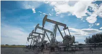  ?? JEFF MCINTOSH THE CANADIAN PRESS FILE PHOTO ?? The Edmonton Par price for Canadian light oil jumped by 61 per cent to $49.75 per barrel during the most recent quarter.