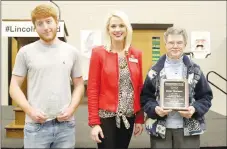  ?? LYNN KUTTER ENTERPRISE-LEADER ?? Heather Keenen, president of Lincoln Area Chamber of Commerce, stands with the two recipients of awards given out Friday at the chamber banquet. Cole Hunton, a senior at Lincoln High, received the John M. Harvey Outstandin­g Youth Award and Doris Thurman was honored with the 2019 Bud Cox Award.