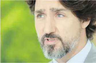  ??  ?? Prime Minister Justin Trudeau during a news conference outside Rideau cottage in Ottawa on Thursday.