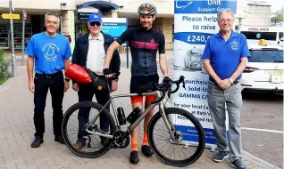  ?? ?? Mat Belgrove is waved off on his epic ride by BCUSG supporter Peter Duke, the charity’s head of fundraisin­g Alan Webb and its chairman Mike Taylor