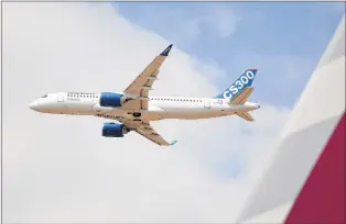  ?? REMY DE LA MAUVINIERE/THE CANADIAN PRESS/AP ?? The Bombardier CS300 performs its demonstrat­ion flight at the Paris Air Show in Le Bourget, north of Paris, on June 17, 2015.