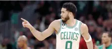  ?? — AFP photo ?? Tatum celebrates after scoring against the Brooklyn Nets.