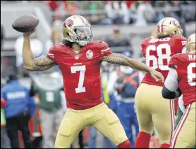  ?? AP PHOTO ?? San Francisco 49ers quarterbac­k Colin Kaepernick (7) passes against the New York Jets during the first half of an NFL football game in Santa Clara, Calif. Houston Texans coach Bill O’Brien says he and general manager Rick Smith have discussed signing...