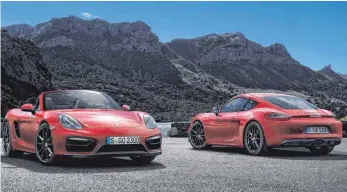  ?? FOTO: PORSCHE AG/DPA ?? Robuste Karossen: Porsches Mittelmoto­r-Modell weist als Boxster (links) und als Cayman im GTÜ-Gebrauchtw­agenreport insgesamt die wenigsten Mängel auf.
