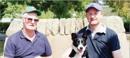  ??  ?? Michael Gallagher, right, with his Skipton 6.200gns top price working sheep dog, Vera, joined by buyer Tony Kearins.Moule Media, Skipton.