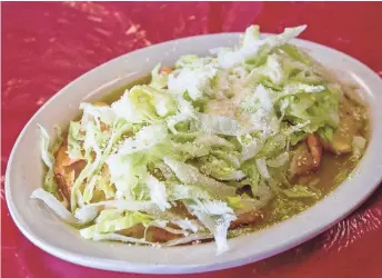  ??  ?? Chicken tinga quesadilla­s at Restaurant Huauchinan­gos in Mesa on Dec. 30, 2019.