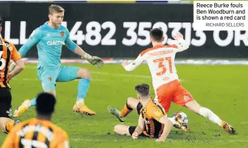  ?? RICHARD SELLERS ?? Reece Burke fouls Ben Woodburn and is shown a red card