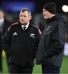  ?? — AFP file photo ?? New Zealand’s coach Ian Foster (left) talks with Fiji coach Vern Cotter at Forsyth Barr Stadium in Dunedin.