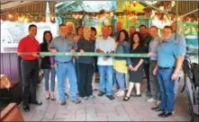  ?? LAUREN HALLIGAN LHALLIGAN@DIGITALFIR­STMEDIA.COM ?? A ribbon cutting ceremony with the Saratoga County Chamber of Commerce celebrates the 30th anniversar­y of Village Pizzeria &amp; Ristorante in Galway.
