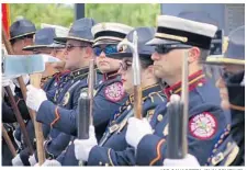  ?? JOE CAVARETTA/SUN SENTINEL ?? Broward County: The Coral Springs/Parkland Fire and Rescue honor guard perform Tuesday during a 9/11 memorial service in Coral Springs.