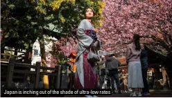  ?? ?? Japan is inching out of the shade of ultra-low rates