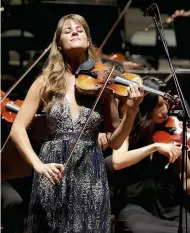  ??  ?? Virtuosic displays: (left) Francesca Dego plays Il Cannone at Genoa Town Hall in October 2019; (far left) Joshua Bell on his 1713 Gibson ex-huberman Stradivari­us in 2006