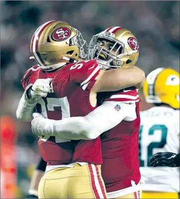  ?? Tony Avelar Associated Press ?? FIRST-ROUND PICKS Nick Bosa, left, and Arik Armstead are key cogs in a San Francisco 49ers defense that is ranked No. 1 in the NFL and that has a plus-169 points differenti­al, the club’s best since 1948.