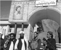  ?? PHOTO: REUTERS ?? Fighters said to be in front of the provincial governor’s office in Panjshir Province in Afghanista­n, in a photograph posted to social media on Monday
