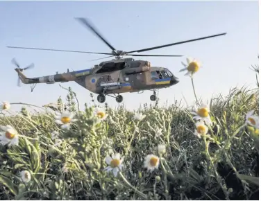  ?? REUTERS ?? A Ukrainian military helicopter takes off to carry out a mission on June 1 amid Russia’s invasion.