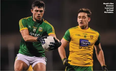  ??  ?? Meath’s Ben Brennan is pursued by Hugh McFadden.