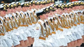  ?? SERGEI KARPUKHIN / REUTERS ?? Russian servicewom­en march during a Tuesday parade marking the World War II victory in Moscow.