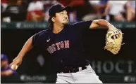  ?? Richard Rodriguez / Getty Images ?? The Red Sox’s Hirokazu Sawamura pitches in the seventh inning against the Rangers on Saturday.