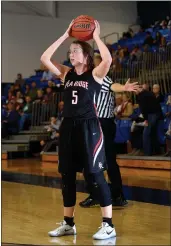  ?? Staff photograph by Anthony Reyes ?? Lady Blackhawk senior Avery Dayberry looks to pass against Shiloh Christian on Monday, Dec. 19, 2016, in Champions Gymnasium in Springdale.