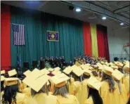  ??  ?? The school choir singing at Troy High School’s 2017 commenceme­nt ceremony on Sunday at Hudson Valley Community College in Troy.