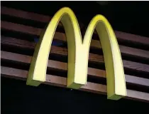  ?? AFP PHOTO ?? HIGHER SALES
File photo of a logo of McDonald’s fast-food restaurant in central London.