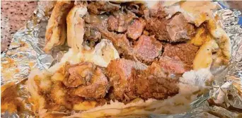  ?? Chuck Blount/Staff ?? J&I Cafe: Carne guisada tacos are favorite from the extensive menu.