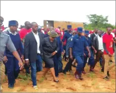  ??  ?? Dr Thokozani Khupe had to be escorted to safety by the police at the burial of MDC leader Mr Morgan Tsvangirai in Buhera