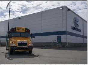  ?? (AP/WABE/Matthew Pearson) ?? An all-electric school bus sits on display in front of the Blue Bird Corp. factory in Fort Valley, Ga., in early February.