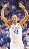  ?? JAMES CRISP/THE ASSOCIATED PRESS ?? Kentucky’s Trey Lyles urges the crowd on during the second half of the Wildcats’ home victory against Arkansas on Saturday.