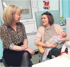  ??  ?? Shona Robison, left, with Kerry Devlin, 24, and Jessica Stuart at Ninewells. Picture: Mhairi Edwards.