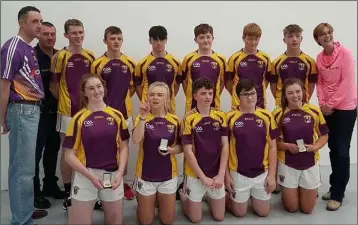  ??  ?? All-Ireland finals players in Castlebrid­ge with coach Gavin Buggy, Co.Juvenile committee member Martin Power, and Co. Juvenile Secretary Marguerite Gore.