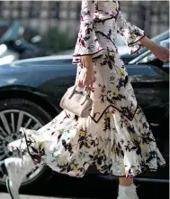  ??  ?? “If it’s floaty and floral, I’ll always do a double take. Shake up the dainty look with flat boots and a tiny top-handle bag.”