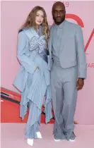  ?? ?? Gigi Hadid and Virgil Abloh arrive at the CFDA fashion awards in 2019 Photograph: Gregory Pace/REX/Shuttersto­ck